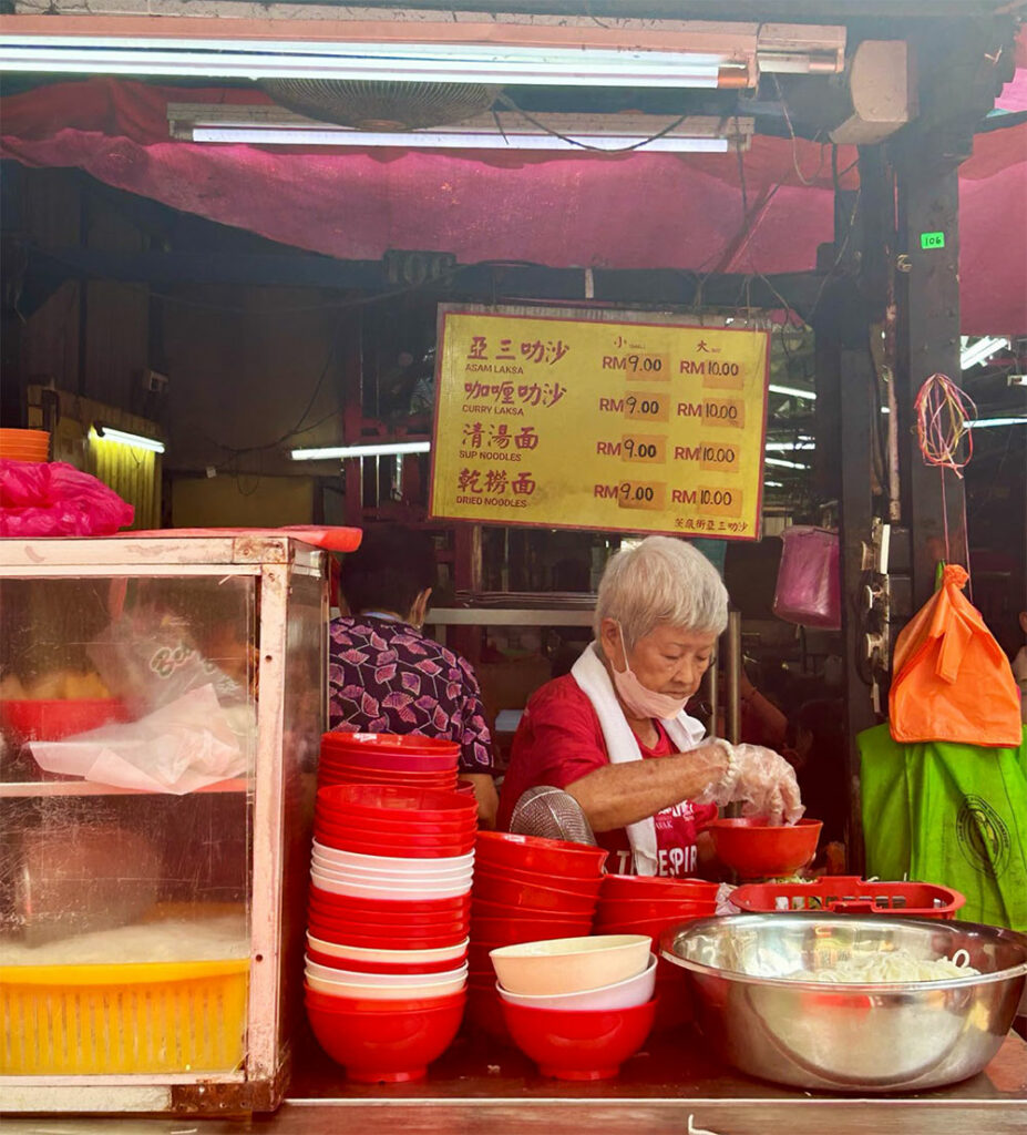 Curry Laksa is the best dish, a typical malayian soup speciality